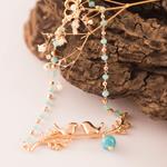 Pulsera de Pajaritos de color oro y aguamarinas