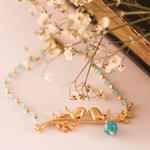 Pulsera de Pajaritos de color oro y aguamarinas